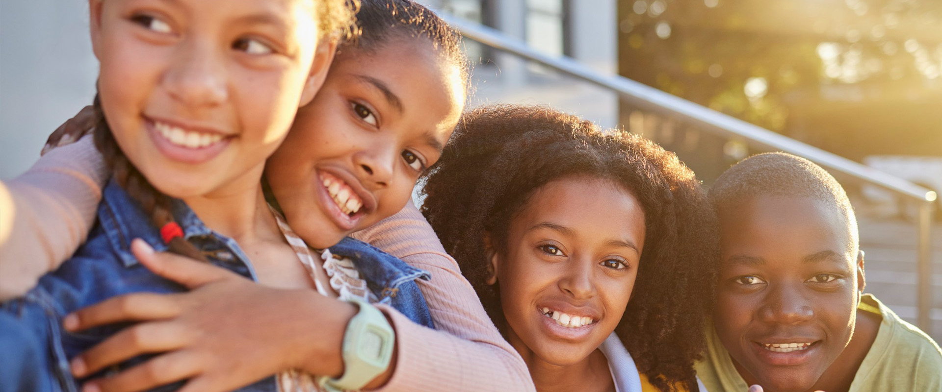 A group of schoolkids smiling